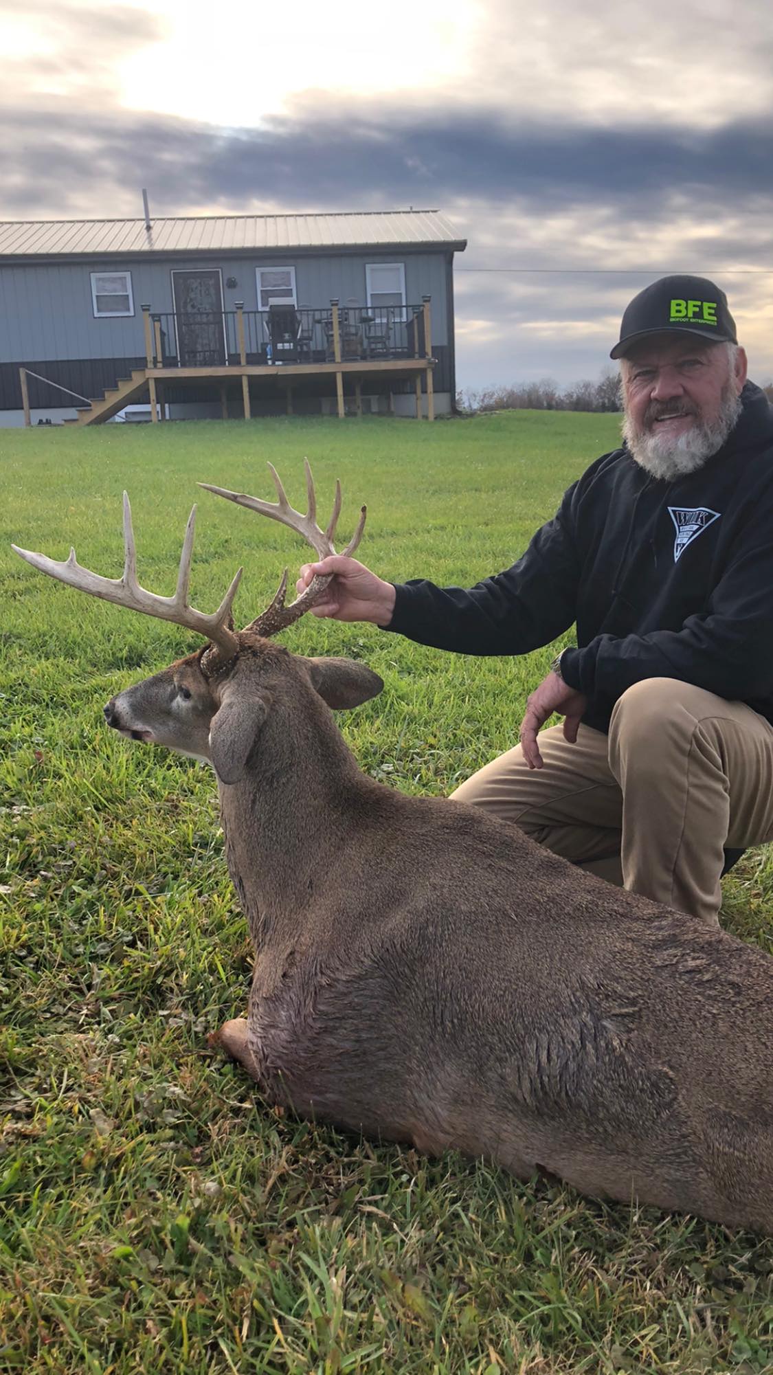 Hunter proudly displays a mature buck harvested in Kentucky.